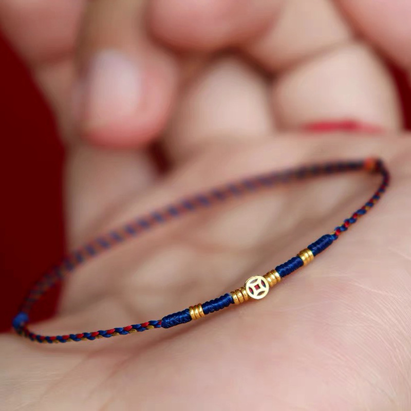Ethnic Fashion Co In - Bracciale intrecciato con moneta in rame